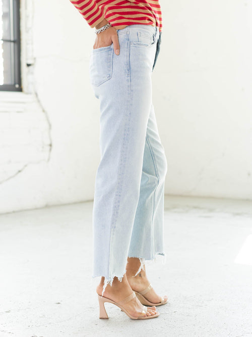 light wash distressed hem denim