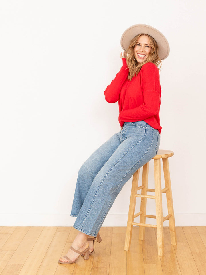 red front seam sweater