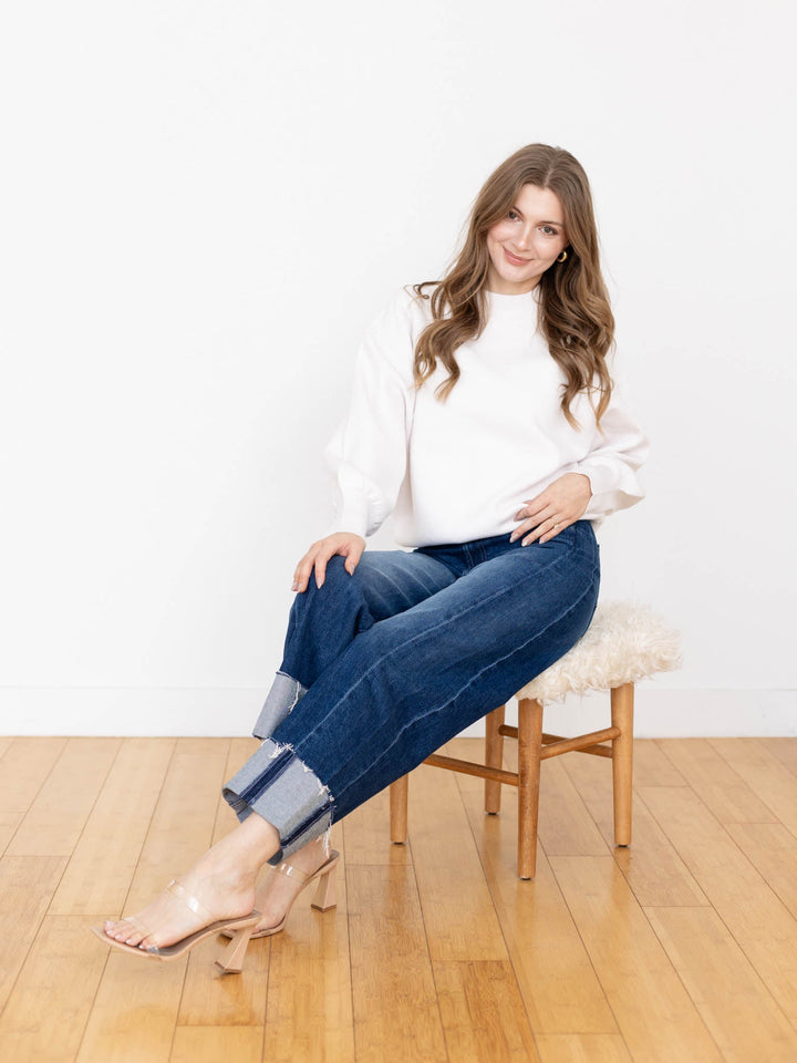 white mock neck sweater