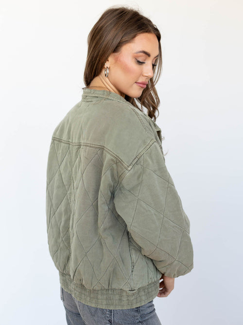 washed green quilted bomber jacket