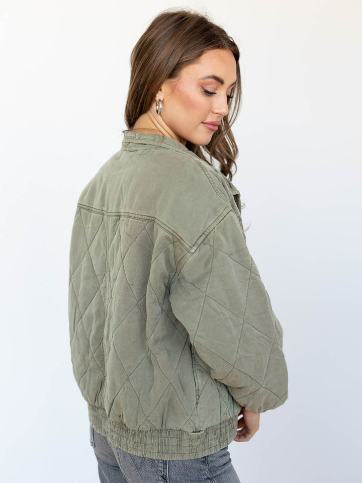 washed green quilted bomber jacket