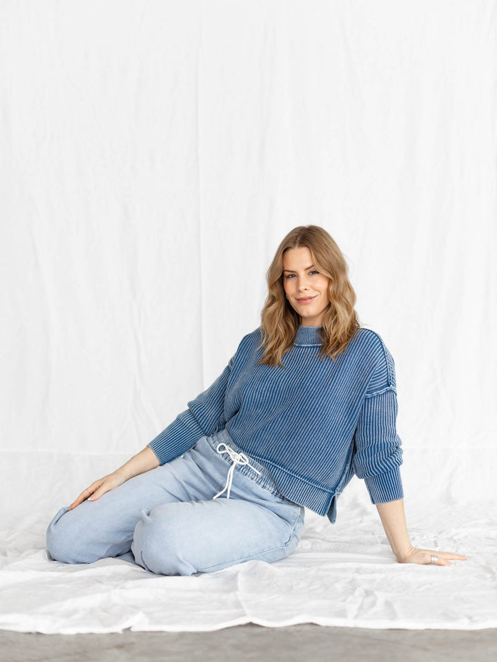 washed blue exposed seam sweater