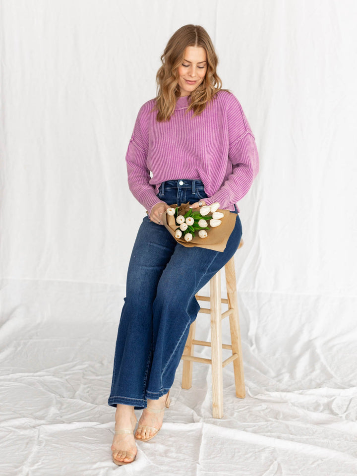 washed violet exposed seam sweater