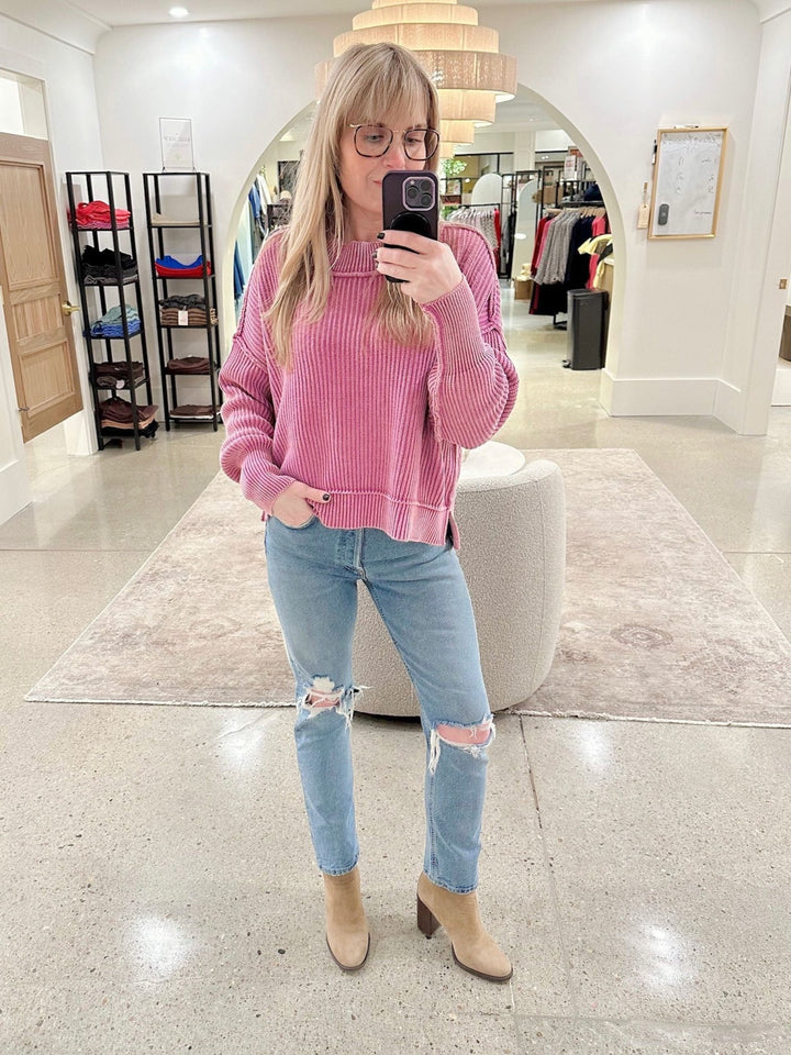 pink colored boxy sweater