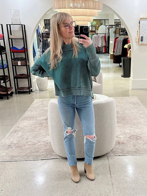 green colored boxy sweater