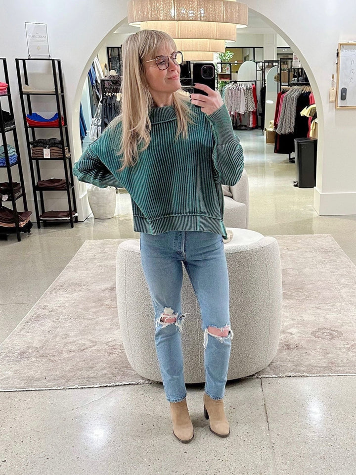 green colored boxy sweater