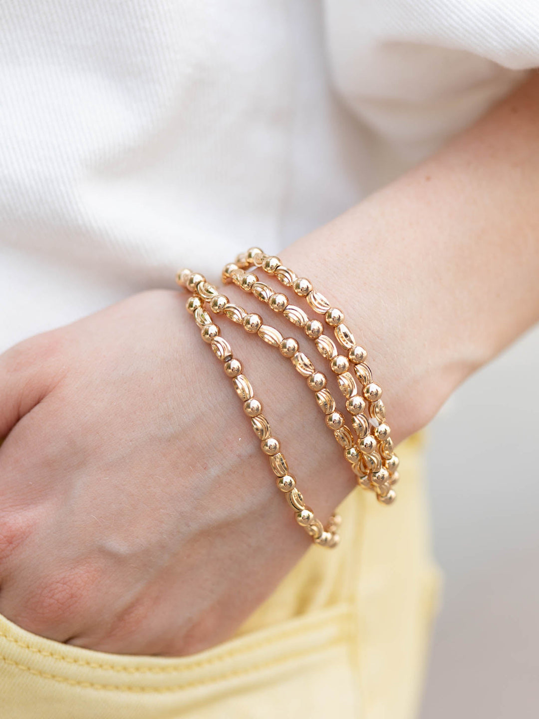 Gold textured oval stretch bracelets