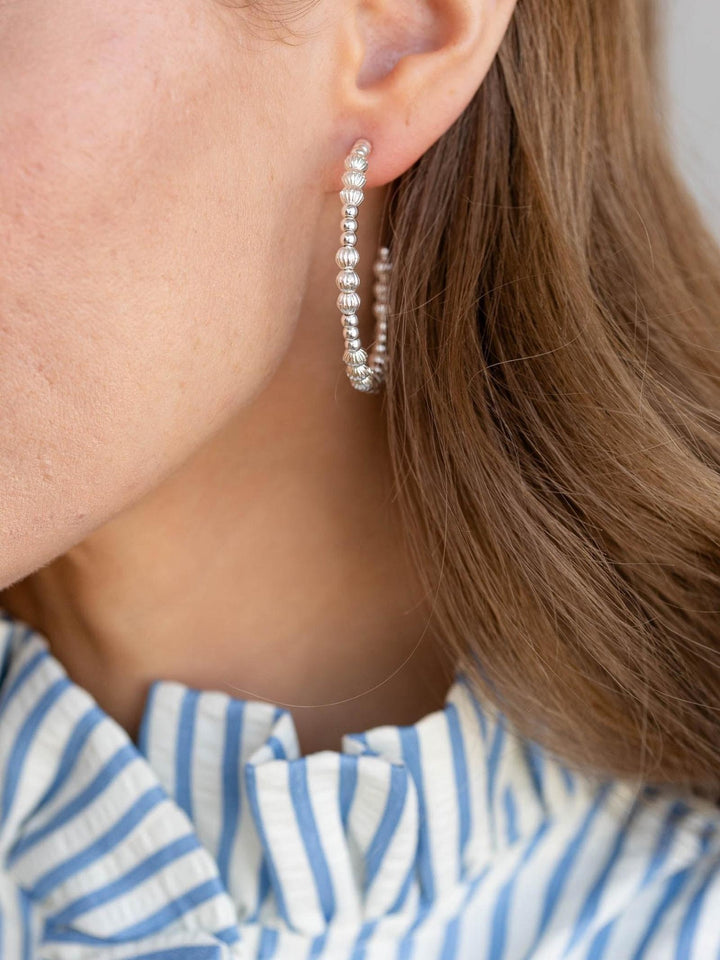 silver beaded hoop earring