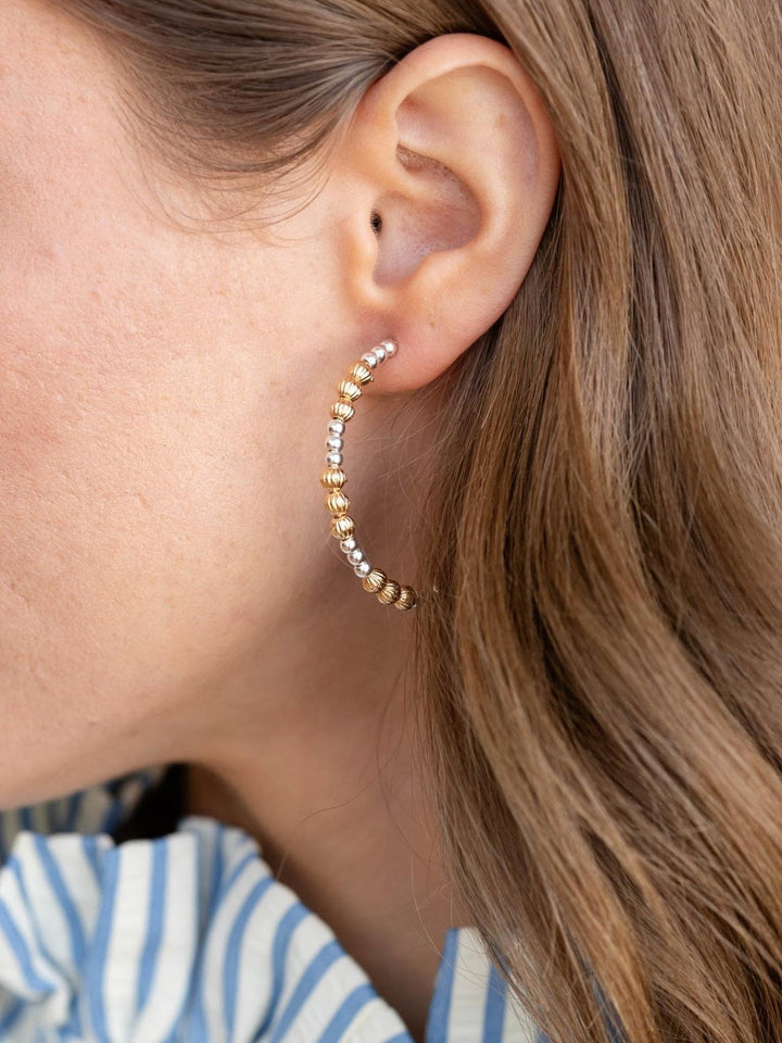 gold and silver beaded hoop earring