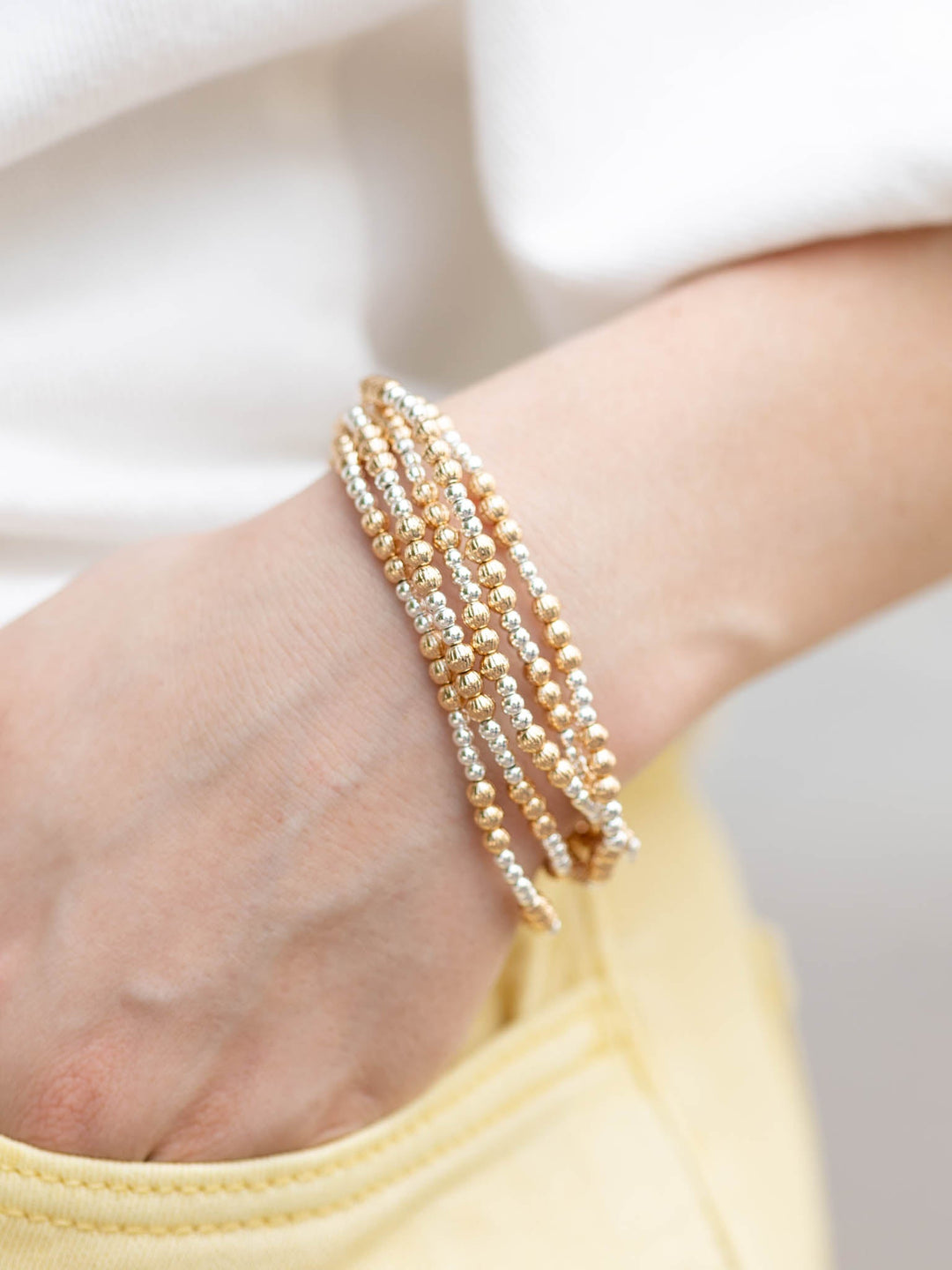 silver and gold beaded bracelet