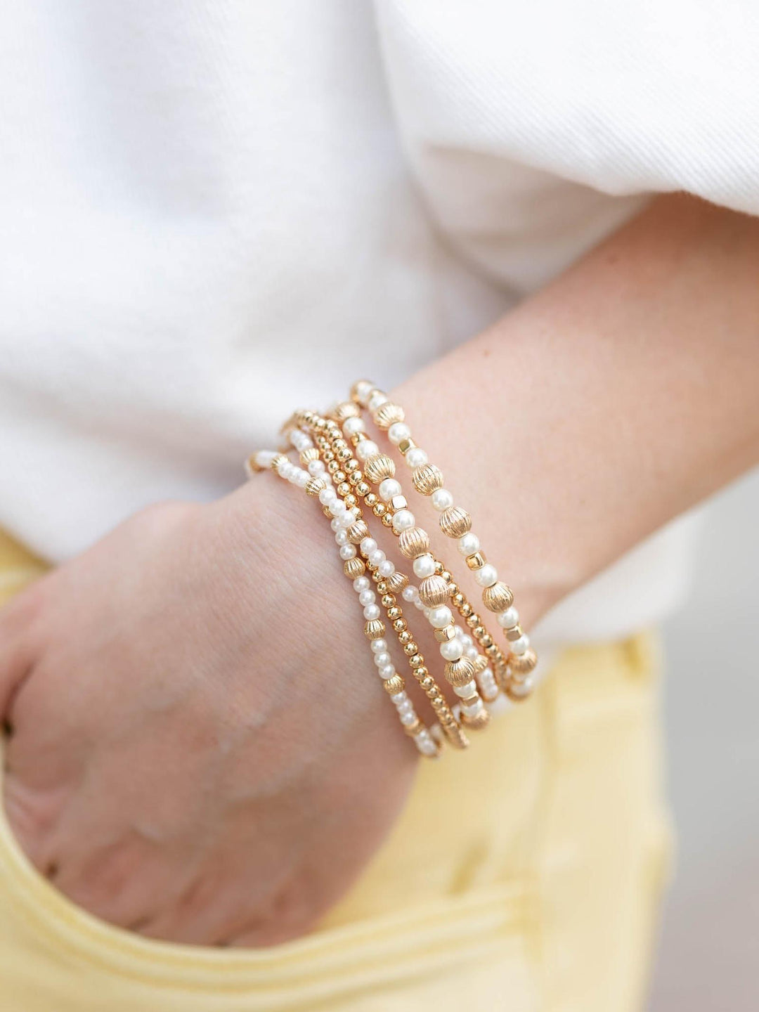 Beaded and pearl gold stretch bracelets