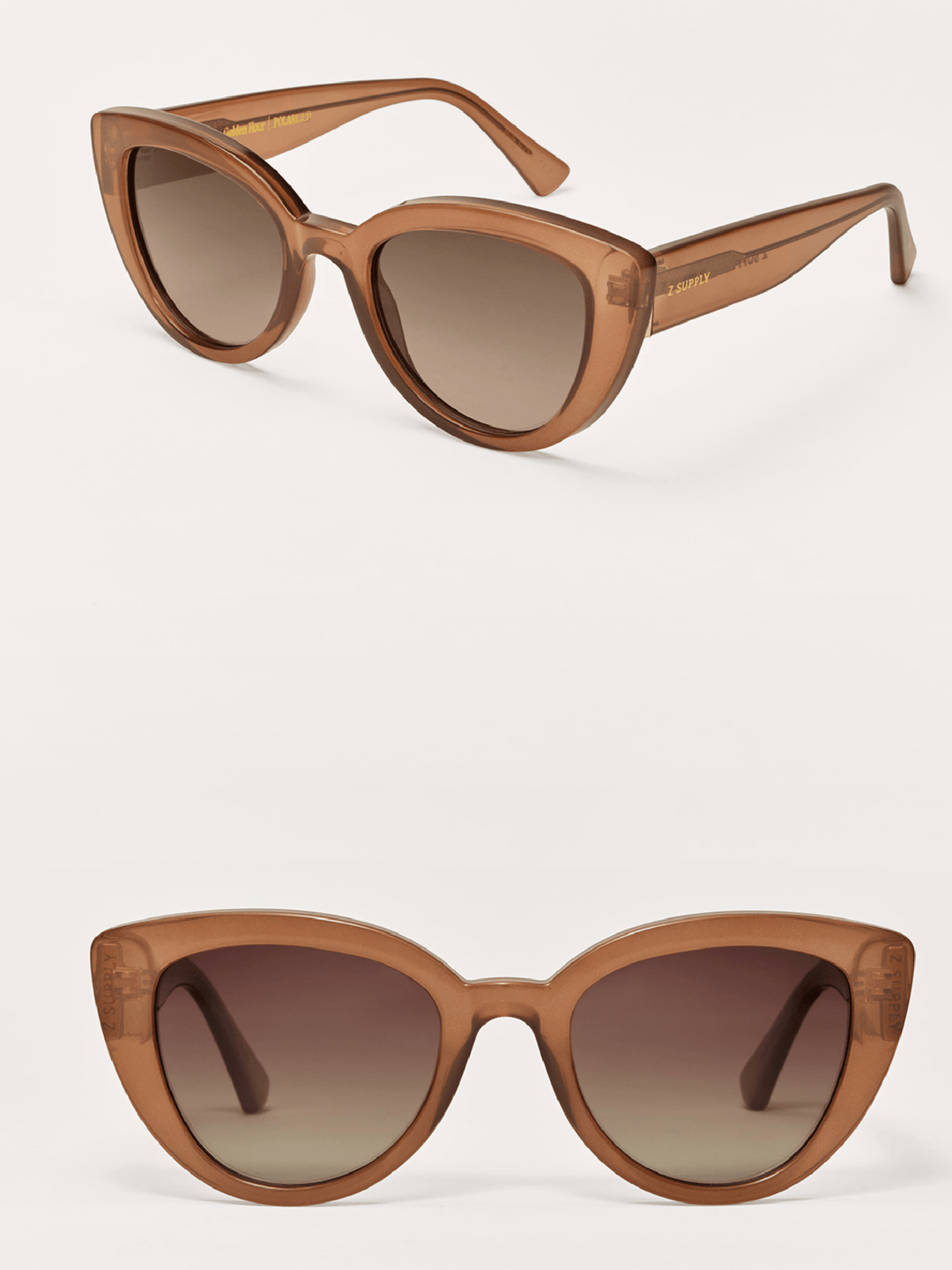 Brown cat-eye sunglasses on a white background