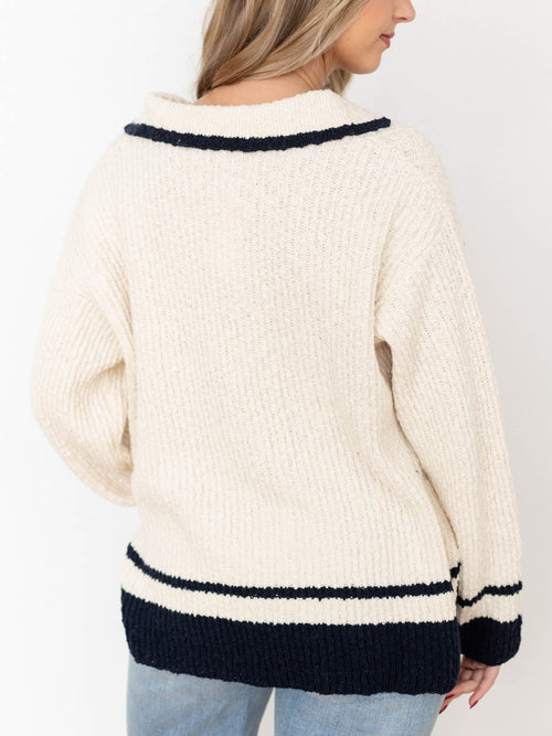 cream and navy polo sweater