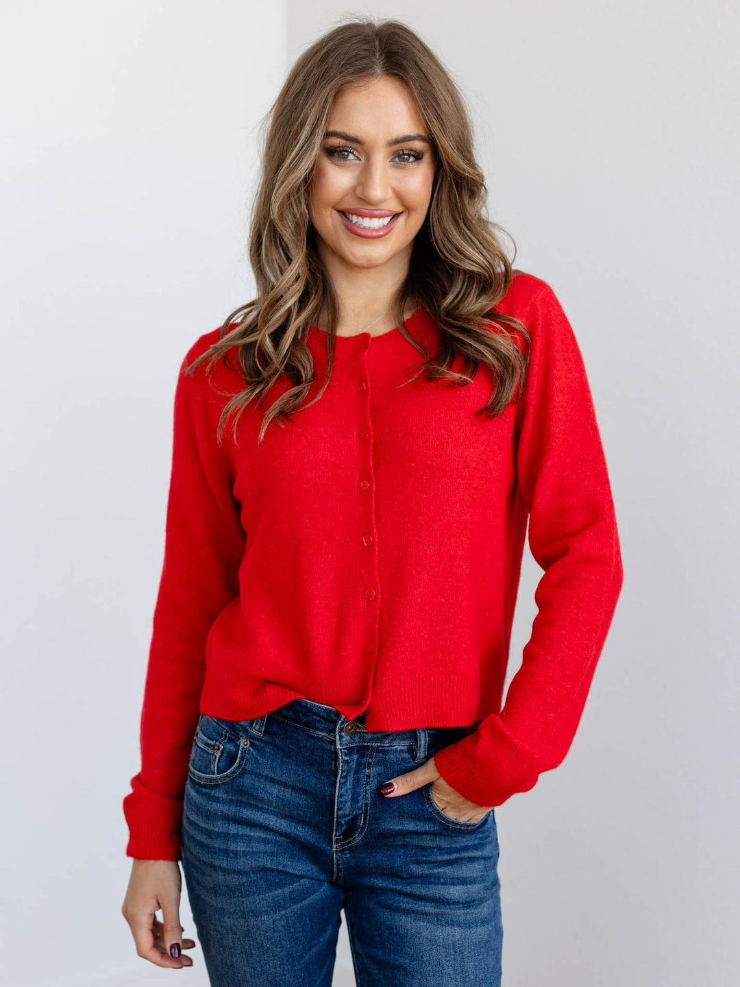 bold red button front sweater