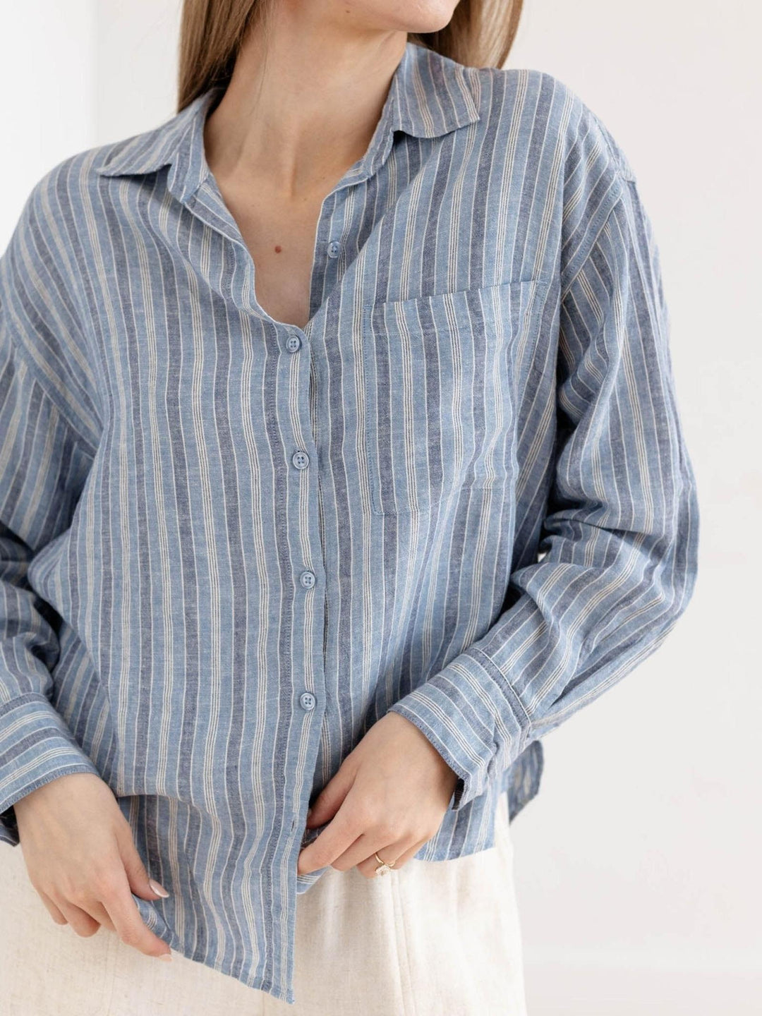 washed blue stripe button down top