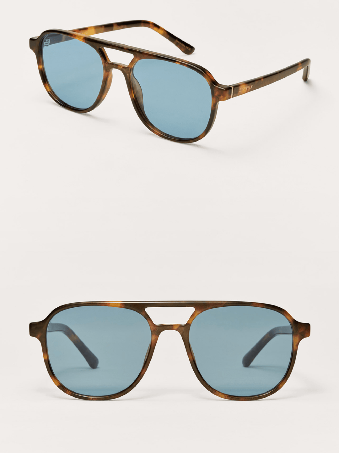 Two pairs of sunglasses shown on a clean white background, one from a top-down angle and one from a front angle. The sunglasses feature a classic double-bridge aviator-style frame in a brown tortoiseshell pattern with light blue lenses.
