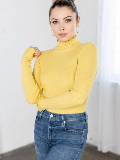 yellow turtle neck top