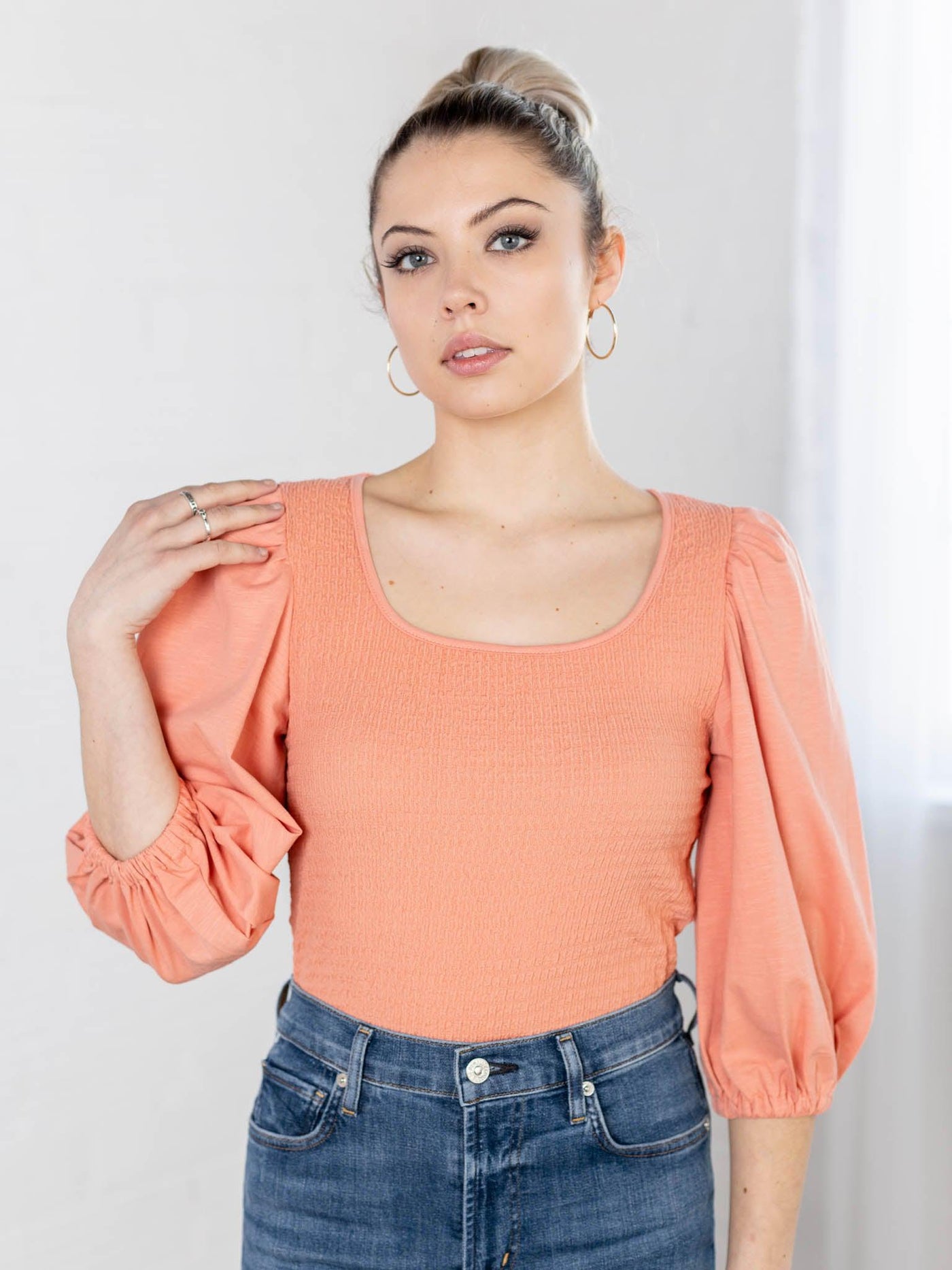 smocked orange top