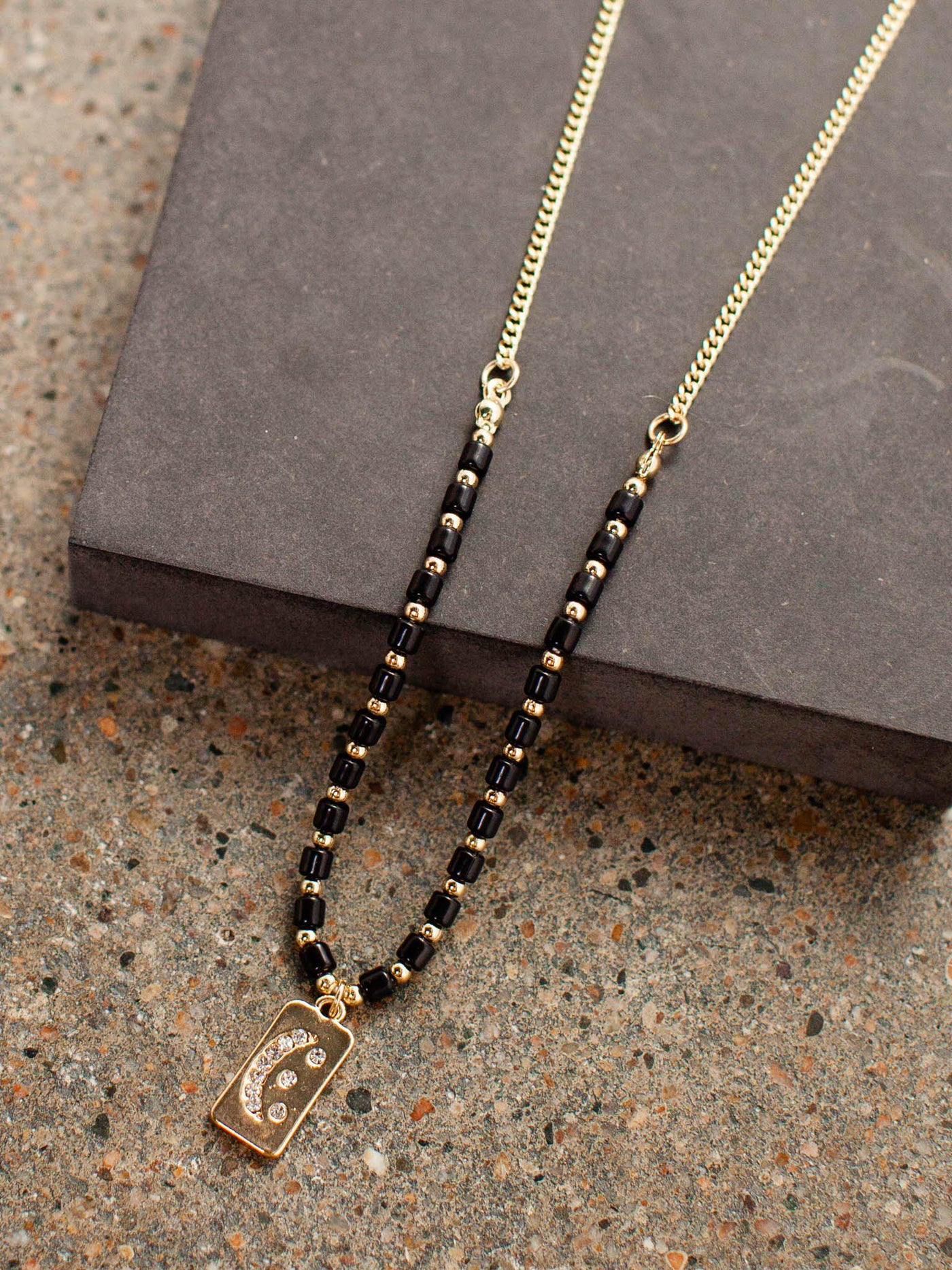 beaded crescent necklace