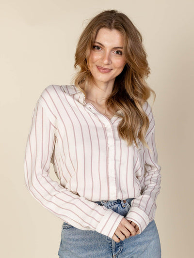 white and pink collared button up