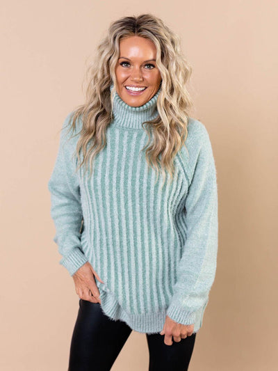 light colored turtleneck