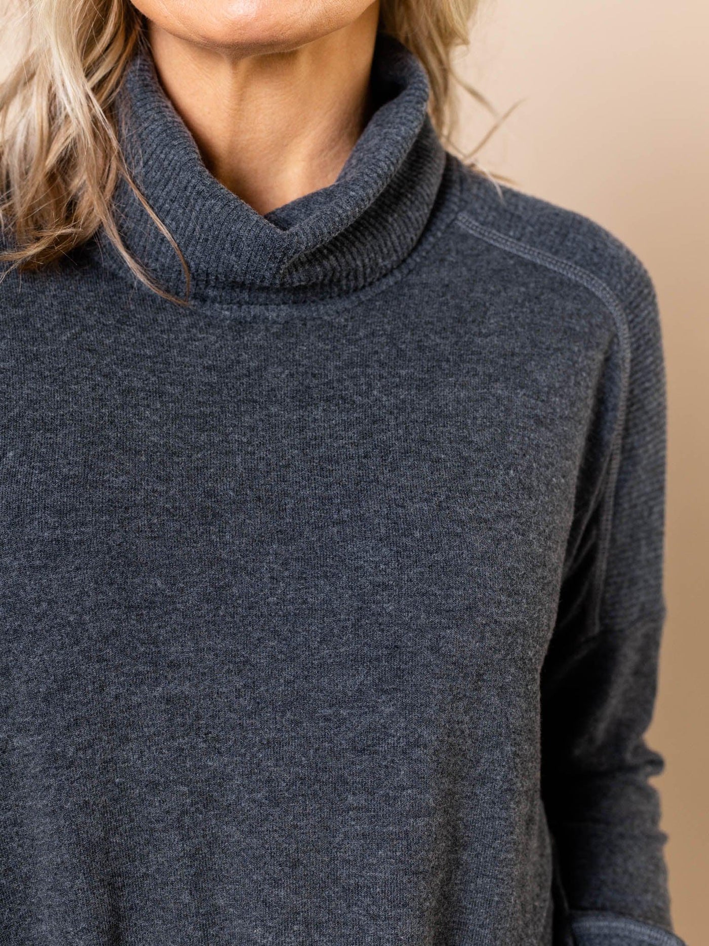 banded bottom knit top