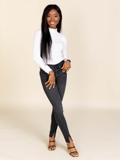 white colored turtleneck sweater top