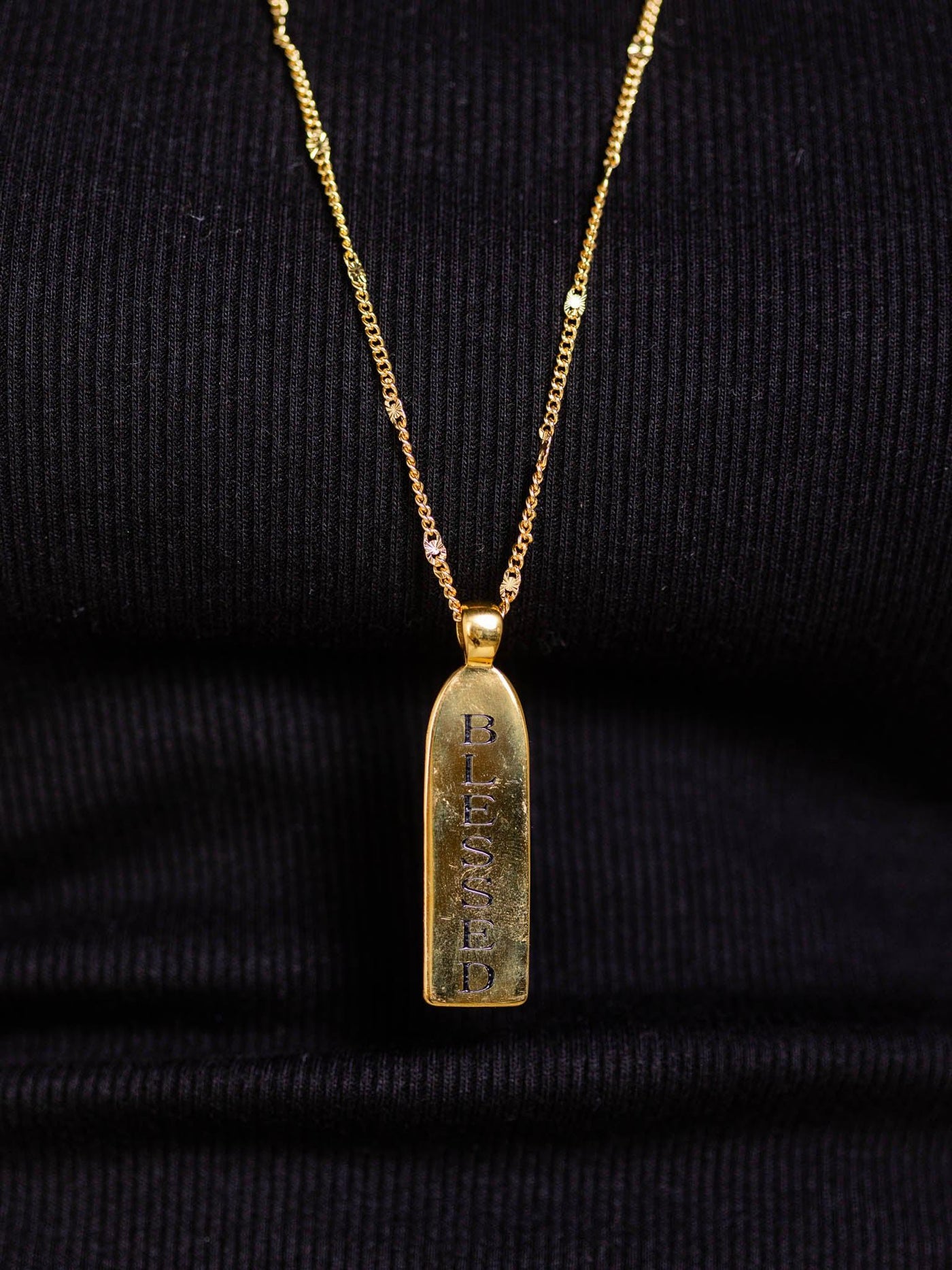 long gold necklace