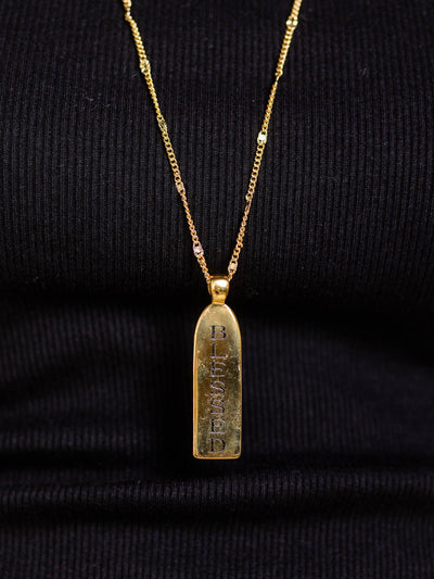long gold necklace