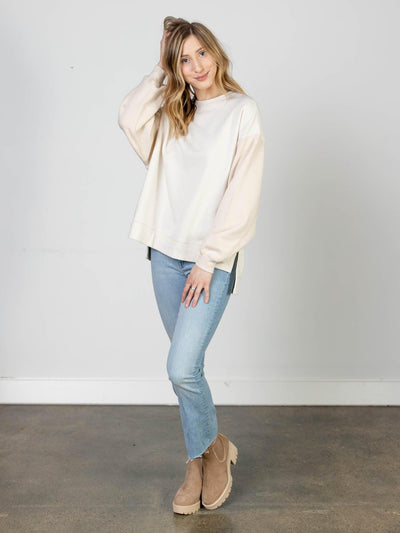 step hem color blocked sweater