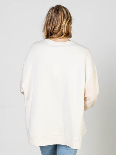 neutral color block sweater