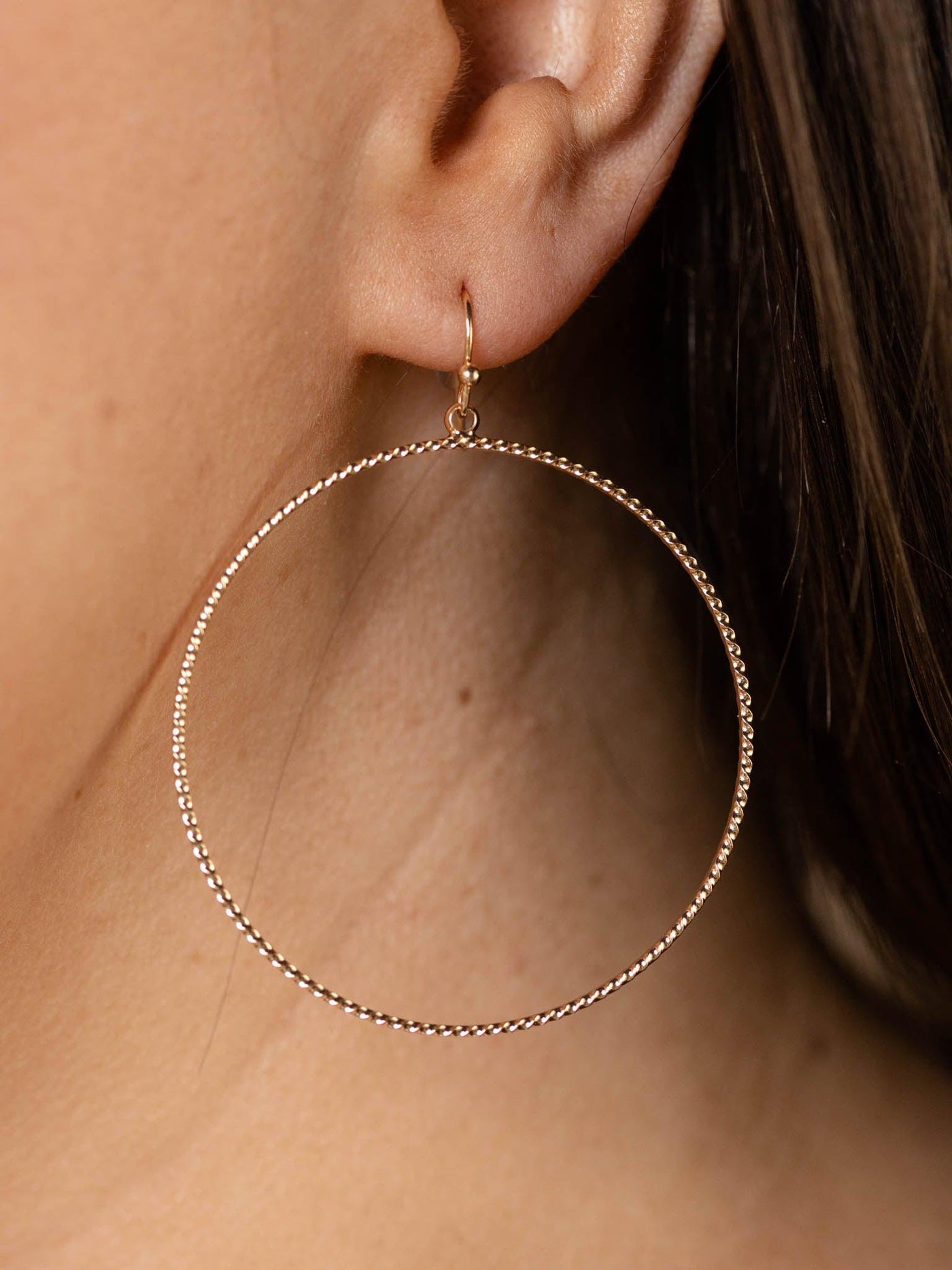 gold textured hoop earring